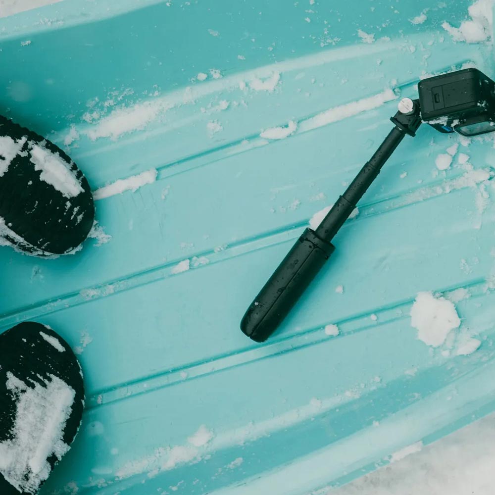 Kort uitschuifbare ministok en statief